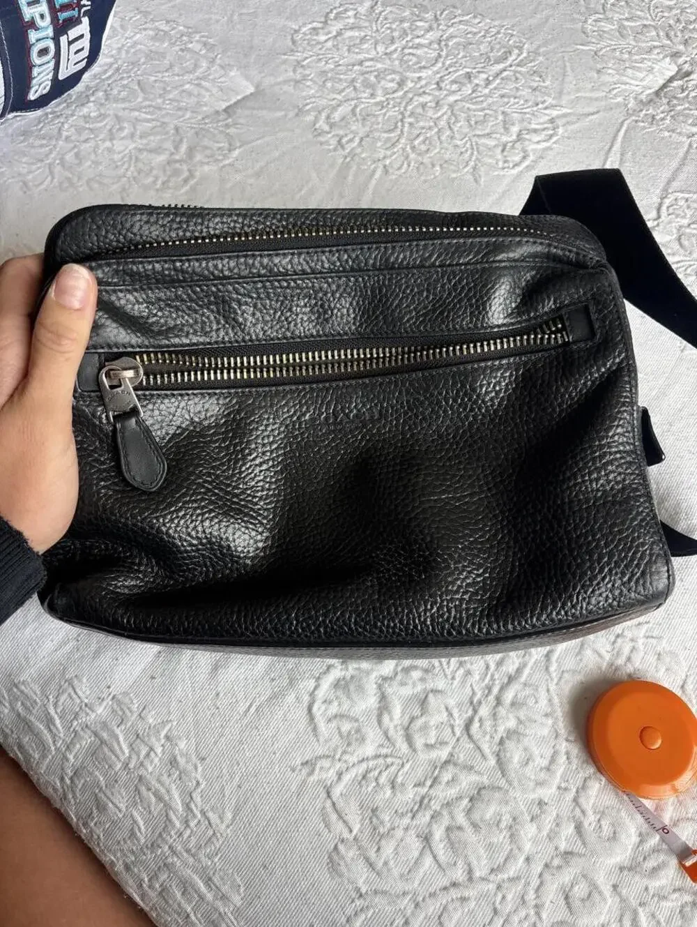 Contact Black pebbled leather crossbody bag